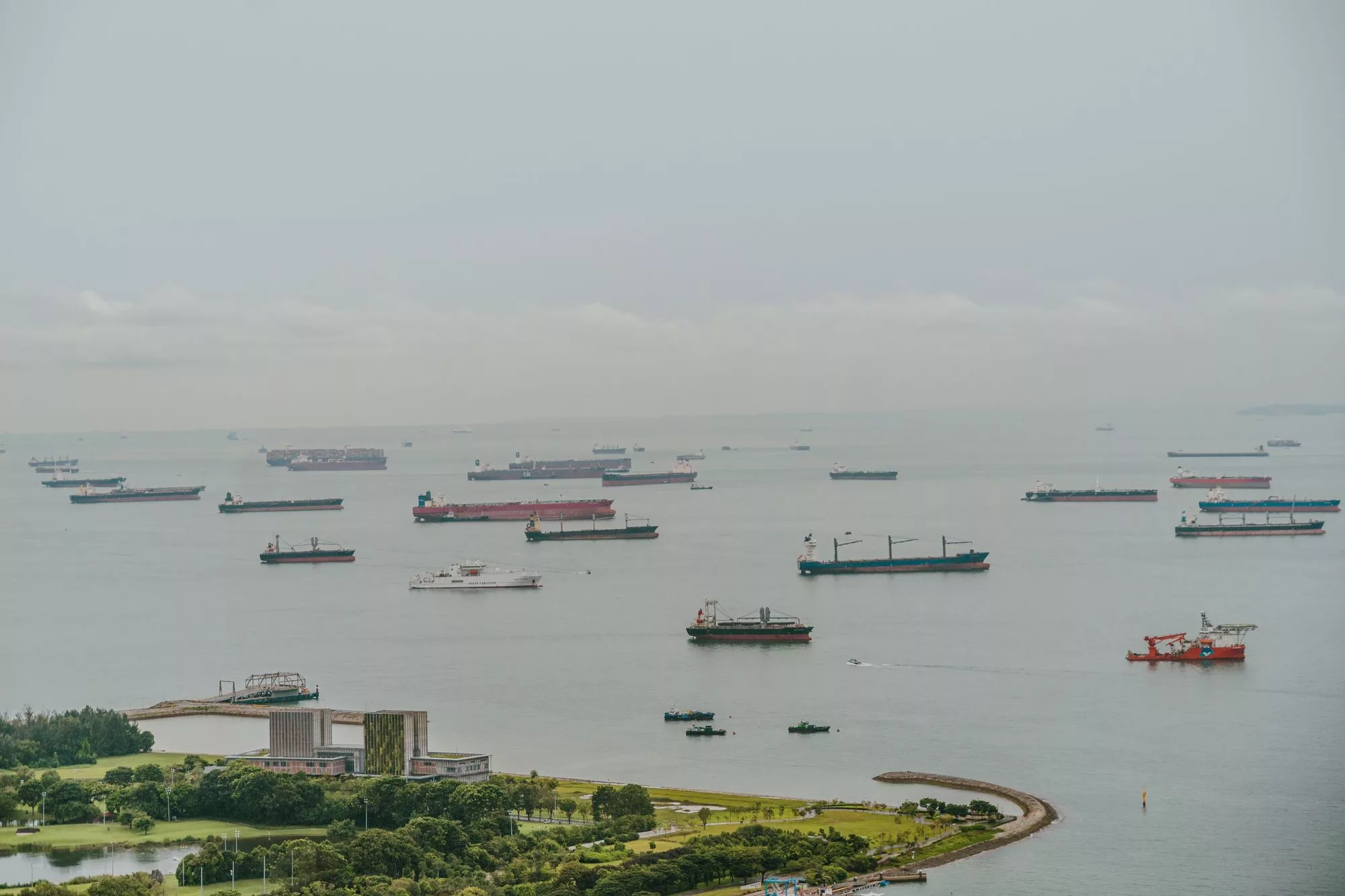 Vessels lying at anchor in a sheltered bay